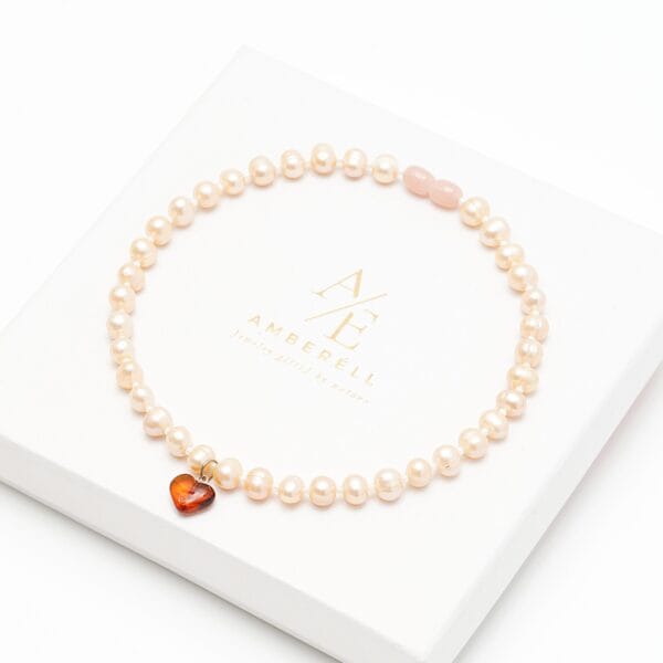 Perlų vėrinys vaikams su pakabuku