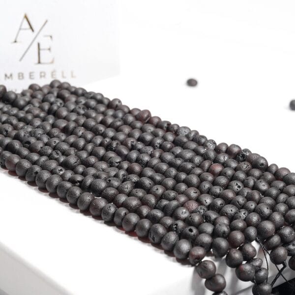 Gręžti gintaro karoliukai