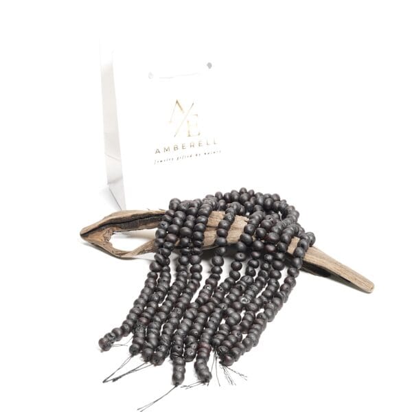 Gręžti gintaro karoliukai