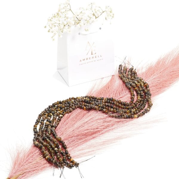 Gręžti gintaro karoliukai