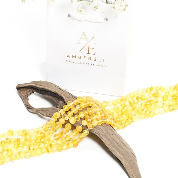 Gręžti gintaro karoliukai