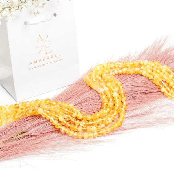 Gręžti gintaro karoliukai